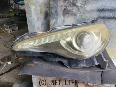 外装・エアロ 左ヘッドライト（HID）