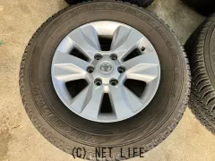 ホイール・タイヤ 17インチ中古トヨタハイラックス125系 純正アルミ4本Set中古タイヤ付J49