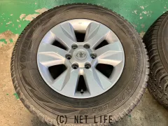 ホイール・タイヤ 17インチ中古トヨタハイラックス125系 純正アルミ4本Set中古タイヤ付J49