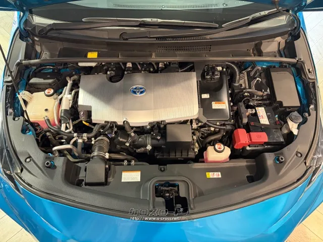 「お問合せはユーポス新都心店まで/098-860-8880お待ちしております」 トヨタ プリウスPHV