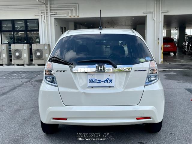 ハイブリッドは、1.3L i-VTECエンジン(88馬力)と軽量・小型なIMA(インテグレーテッド・モーター・アシスト)(14馬力)を組み合わせたシステムにより、30km/Lの優れた燃費性能を達成。 ホンダ フィットハイブリッド