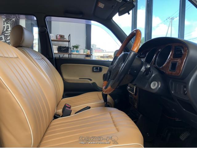 ミラジーノ専用の新品シートカバーを装着。見た目も乗り心地も抜群です。 ダイハツ ミラジーノ