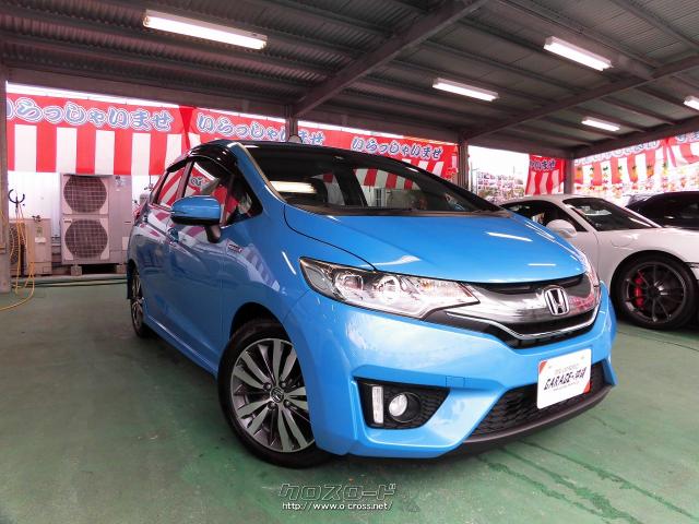 ホンダ フィットハイブリッド 1 5 Sパッケ パドルシフト ナビ フルセグ Ledライト バックモニターvr 禁煙車の人気グレード 13 H25 年式 ビビットスカイブルー 1500cc Garage 沖縄 琉大前本店 6 4万km 保証付 3ヶ月 5千km 沖縄の中古車情報 クロスロード