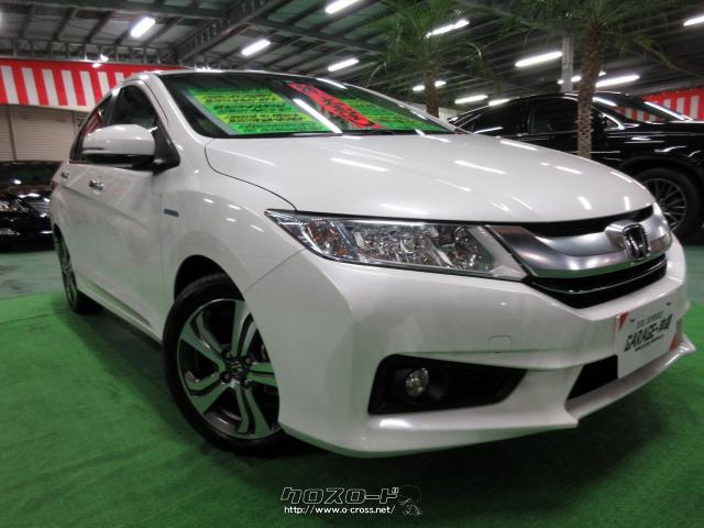 ホンダ グレイス ハイブリッド1 5ex 純正ナビ フルセグ Ledライト バックカメラ ハーフレザーvr禁煙車の実走km 14 H26 年式 パール 1500cc Garage 沖縄 琉大前本店 2万km 保証付 3ヶ月 5千km 沖縄の中古車情報 クロスロード