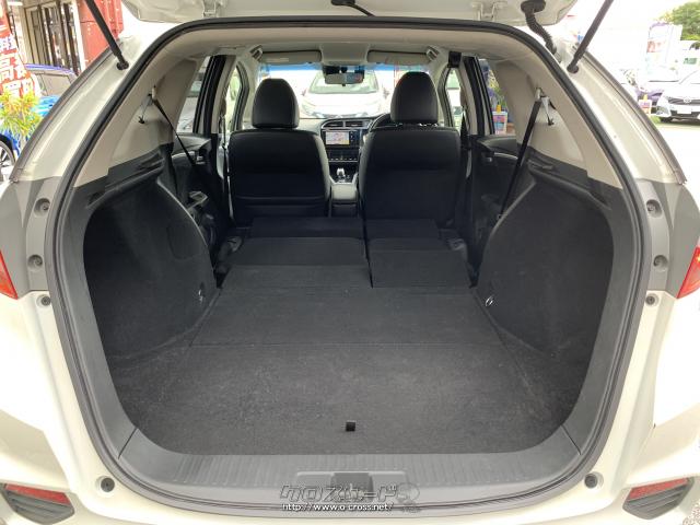 後席を倒す事で大きな荷物を積み込み可能に。 ホンダ シャトル
